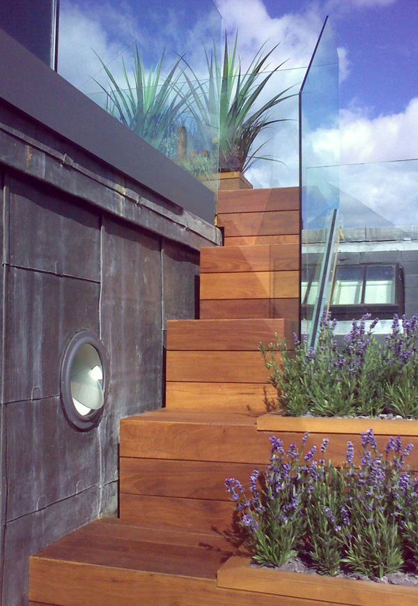 Wooden treads with embedded planters.